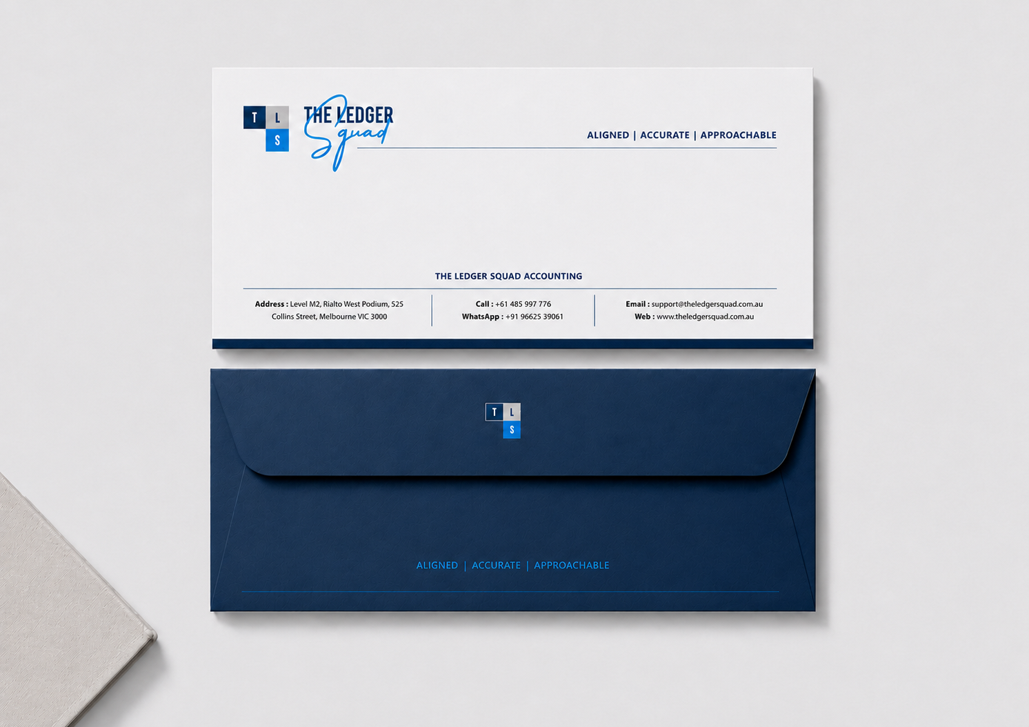 The Ledger Squad DL letterhead and navy envelope flap